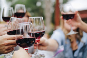 Five glasses of Westcott Vineyards Reserve Pinot Noir raised in a toast.
