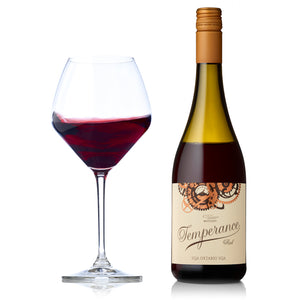 A bottle and glass of Westcott Vineyards' Temperance Red Wine Blend.