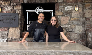 Chef Lester Hornilla and his partner Annie in front of the outdoor, wood-fired oven on the Westcott Vineyard's Niagara patio.
