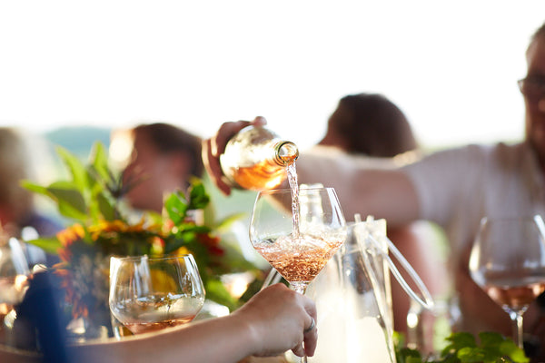 Winemaker Casey Kulczyk pours a glass of Westcott Vineyards Pinot Noir Rosê.