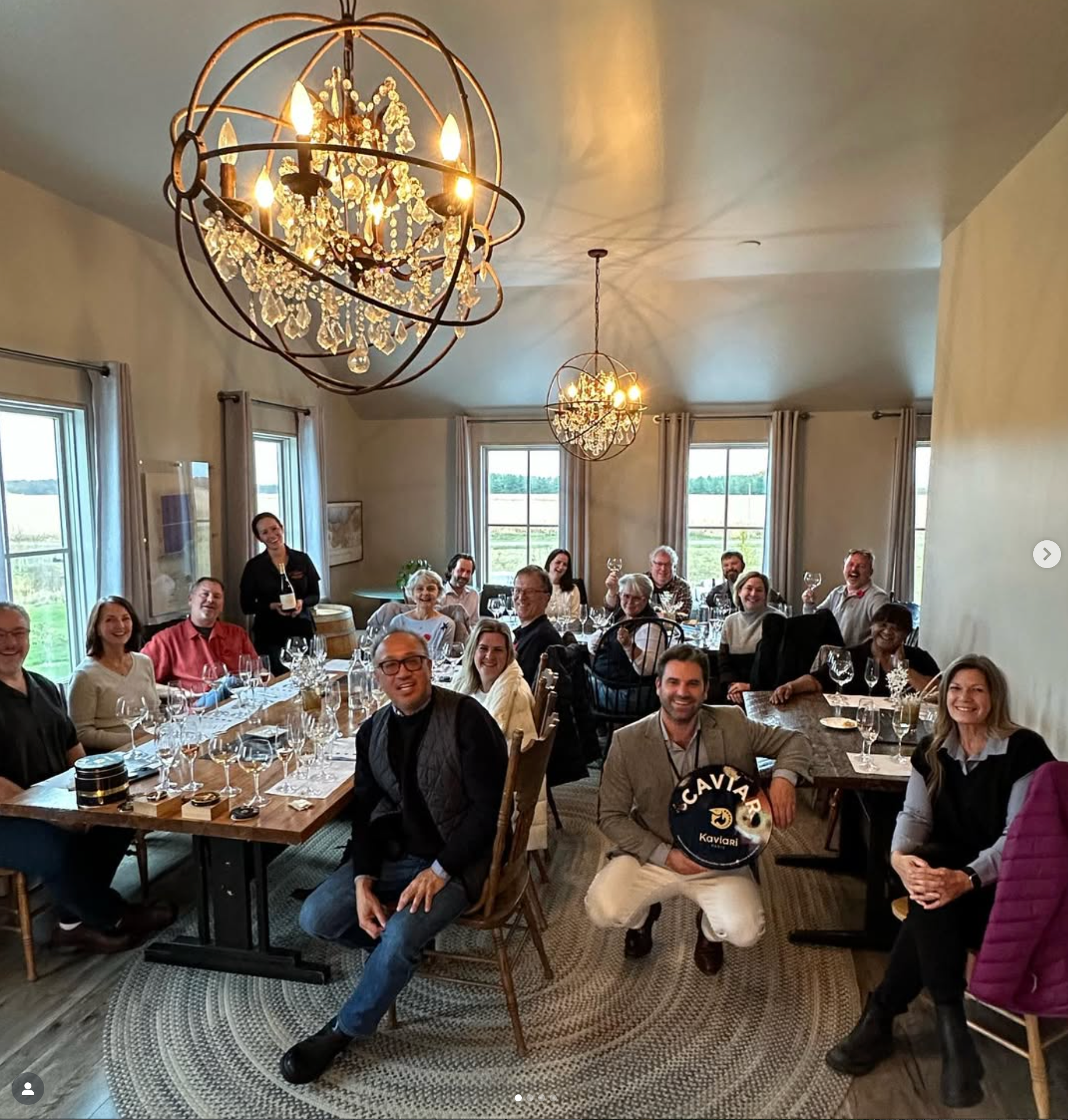 Three tables of Westcott wine club members enjoying a members only caviar-themed lunch.