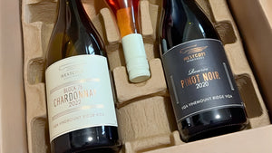 Three bottles of Westcott Vineyards wine in a cardboard box with labels visible.